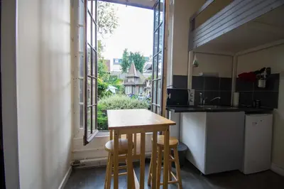 Cuisine ou kitchenette dans l'établissement Studio Gare