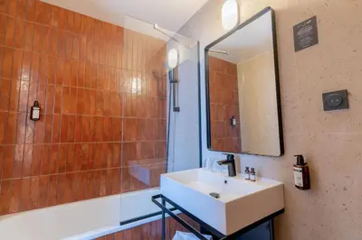 Salle de bains dans l'établissement Grand Hôtel De La Seine