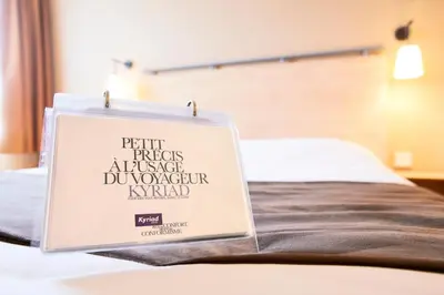 Un ou plusieurs lits dans un hébergement de l'établissement Kyriad Beauvais Sud