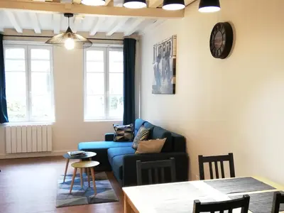 Coin salon dans l'établissement Welk'Home Loft Rouen CHU - Coeur Historique