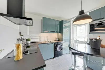 Cuisine ou kitchenette dans l'établissement Le paradis de Lila