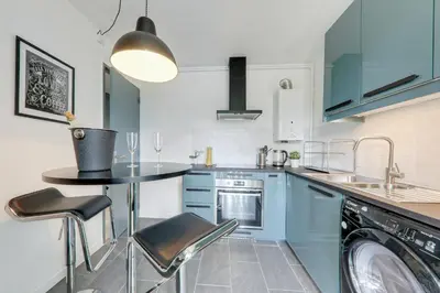 Cuisine ou kitchenette dans l'établissement Le paradis de Lila