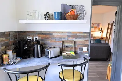 Cuisine ou kitchenette dans l'établissement Eco-Appart'hôtel Rouen - JDP