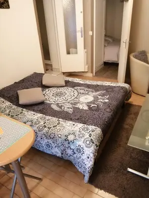 Un ou plusieurs lits dans un hébergement de l'établissement appartement type f2 proche PARIS 25 KM
