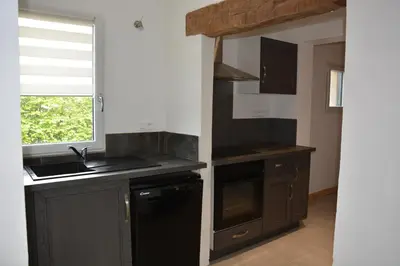 Cuisine ou kitchenette dans l'établissement Au Moulin de Rotteleux