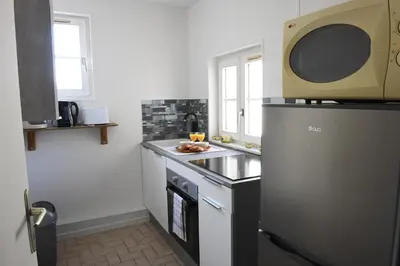 Cuisine ou kitchenette dans l'établissement Le Verdier