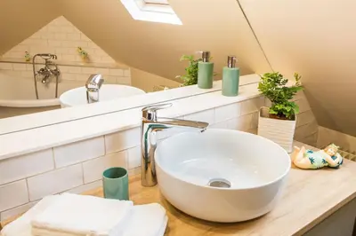 Salle de bains dans l'établissement Au Souffle de Vert