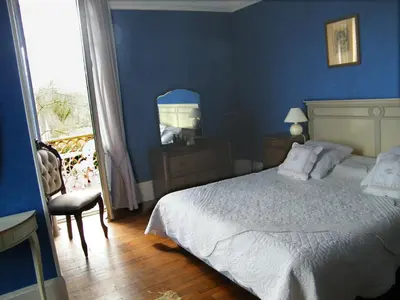 Un ou plusieurs lits dans un hébergement de l'établissement Villa Les Iris