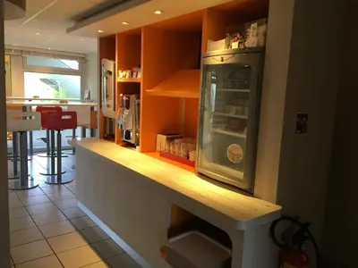 Cuisine ou kitchenette dans l'établissement Premiere Classe Herblay