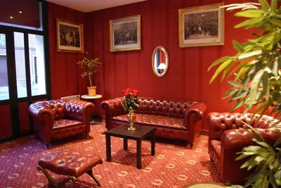 Coin salon dans l'établissement Hôtel 1er Consul Rouen