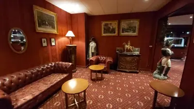 Coin salon dans l'établissement Hôtel 1er Consul Rouen
