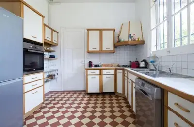 Cuisine ou kitchenette dans l'établissement Le Manoir