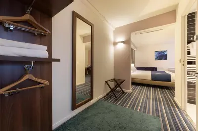 Un ou plusieurs lits dans un hébergement de l'établissement Holiday Inn Express Amiens by IHG