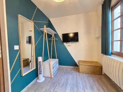 Télévision ou salle de divertissement dans l'établissement studi'home