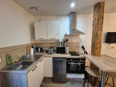 Cuisine ou kitchenette dans l'établissement studi'home