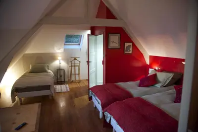 Un ou plusieurs lits dans un hébergement de l'établissement La Bellevue, maison entière