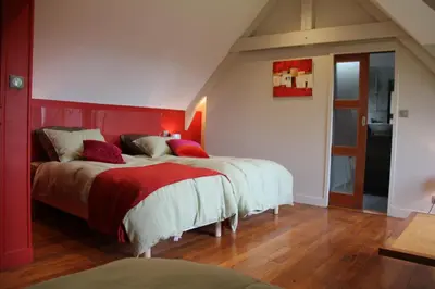 Un ou plusieurs lits dans un hébergement de l'établissement La Bellevue, maison entière