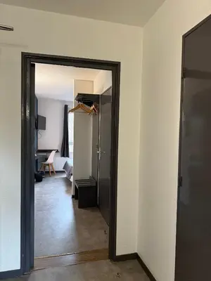 Un ou plusieurs lits dans un hébergement de l'établissement Hôtel La Nonette ASTERIX, CDG AIRPORT & PARIS CENTRE