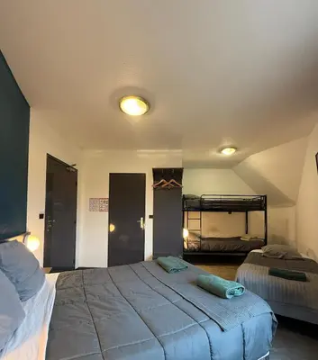 Un ou plusieurs lits dans un hébergement de l'établissement Hôtel La Nonette ASTERIX, CDG AIRPORT & PARIS CENTRE
