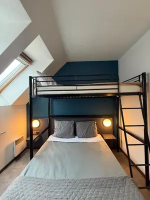 Un ou plusieurs lits dans un hébergement de l'établissement Hôtel La Nonette ASTERIX, CDG AIRPORT & PARIS CENTRE