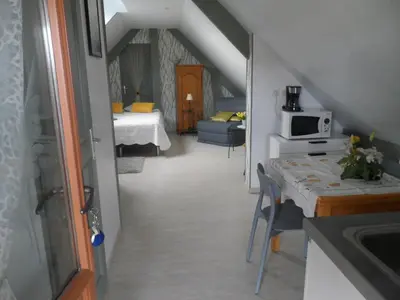 Un ou plusieurs lits dans un hébergement de l'établissement chambre d'hôte équipée en studio