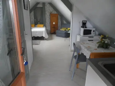 Un ou plusieurs lits dans un hébergement de l'établissement chambre d'hôte équipée en studio