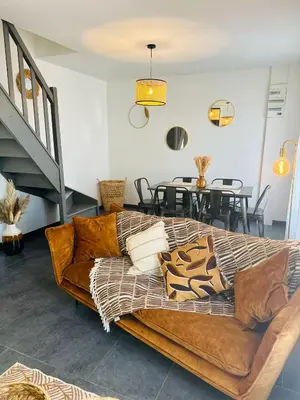 Coin salon dans l'établissement Gîte la volette
