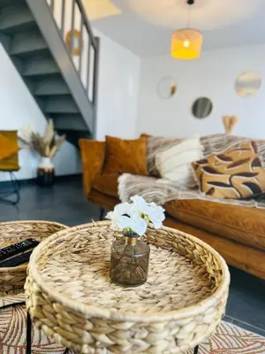 Coin salon dans l'établissement Gîte la volette