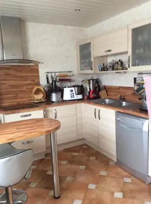 Cuisine ou kitchenette dans l'établissement Chez Chantal