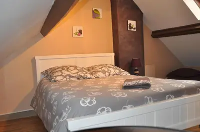 Un ou plusieurs lits dans un hébergement de l'établissement Chambres d'Hôtes L'Alezan