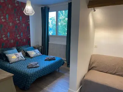Coin salon dans l'établissement Suite alcôve confort