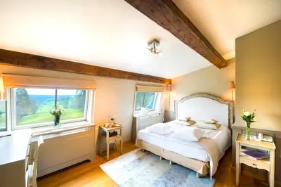 Un ou plusieurs lits dans un hébergement de l'établissement Chateau-Hotel De Belmesnil