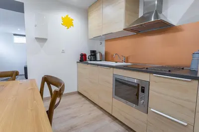 Cuisine ou kitchenette dans l'établissement La Dimiere - Le Postel - Appartements de standing en hyper-centre - Louviers