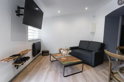 Télévision ou salle de divertissement dans l'établissement La Dimiere - Le Postel - Appartements de standing en hyper-centre - Louviers