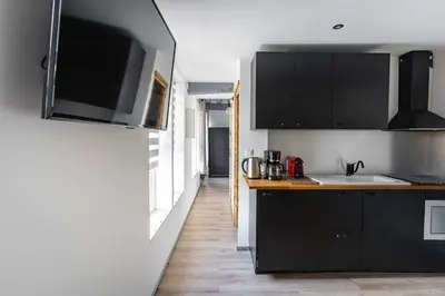 Cuisine ou kitchenette dans l'établissement La Dimiere - Le Postel - Appartements de standing en hyper-centre - Louviers