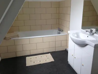 Salle de bains dans l'établissement Le Château de Grèges
