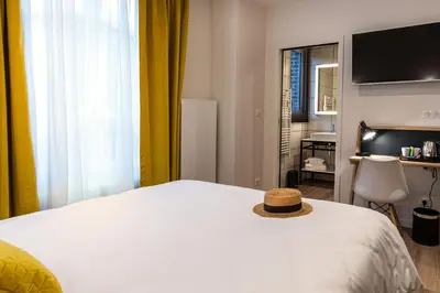 Un ou plusieurs lits dans un hébergement de l'établissement Mayrena Hotel Restaurant