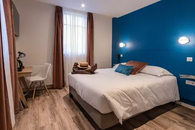 Un ou plusieurs lits dans un hébergement de l'établissement Mayrena Hotel Restaurant