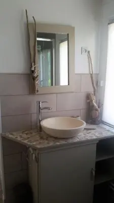 Salle de bains dans l'établissement Les Trois Roses