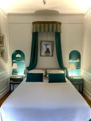 Un ou plusieurs lits dans un hébergement de l'établissement VILLA la GLORIETTE