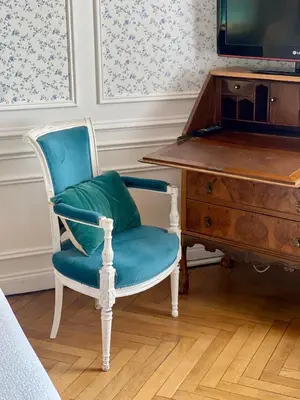 Télévision ou salle de divertissement dans l'établissement VILLA la GLORIETTE
