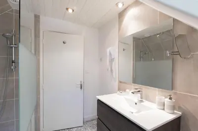 Salle de bains dans l'établissement LA MAISON DES CHEVAUX