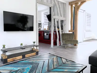 Télévision ou salle de divertissement dans l'établissement Eco-Appart'hôtel Rouen - BDE
