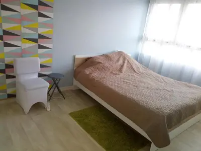 Un ou plusieurs lits dans un hébergement de l'établissement Appartement lumineux proche de Rouen et Paris