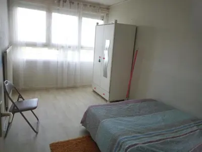 Un ou plusieurs lits dans un hébergement de l'établissement Appartement lumineux proche de Rouen et Paris
