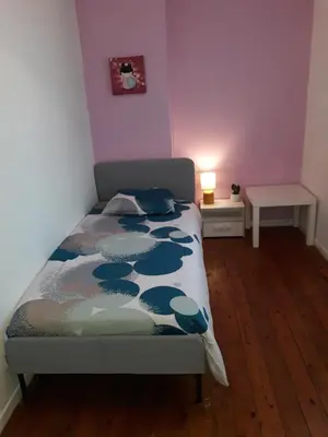 Un ou plusieurs lits dans un hébergement de l'établissement L'escale Arquaise, la maison au jardin fleuri à 5 min de dieppe 7 jours minimum