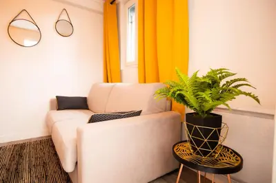 Coin salon dans l'établissement Appart Coeur de Rouen - Le Roi