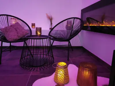 Coin salon dans l'établissement Les Sansonnets Appart & Spa