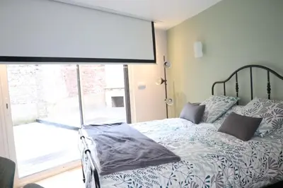 Un ou plusieurs lits dans un hébergement de l'établissement Suite Melody double balnéo, home-cinéma, terrasse à Dieppe
