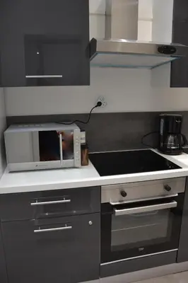 Cuisine ou kitchenette dans l'établissement Petit T2 hypercentre avec terrasse privée - 006